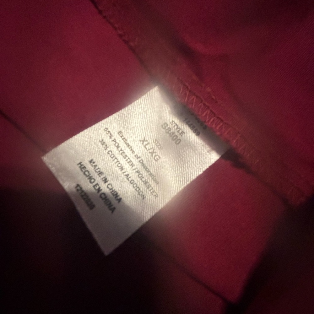 Burgandy colored scrubs, set of three, two tops, one pants, never worn. Smoke fr